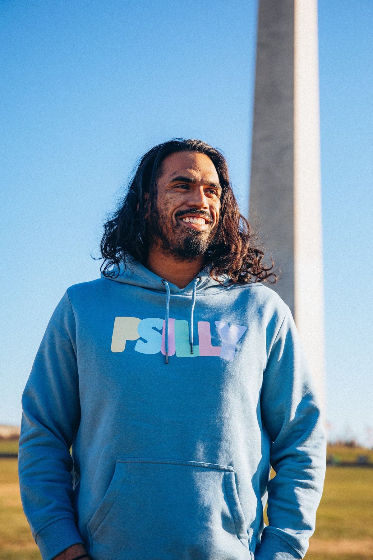 Blue hoodie with pastel PSILLY logo